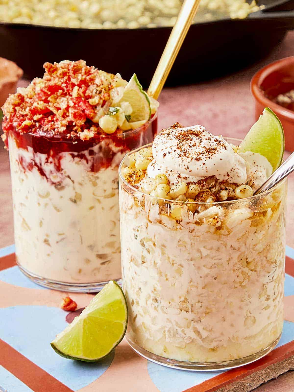 Esquite cups with corn, cream, cheese, lime, and chili